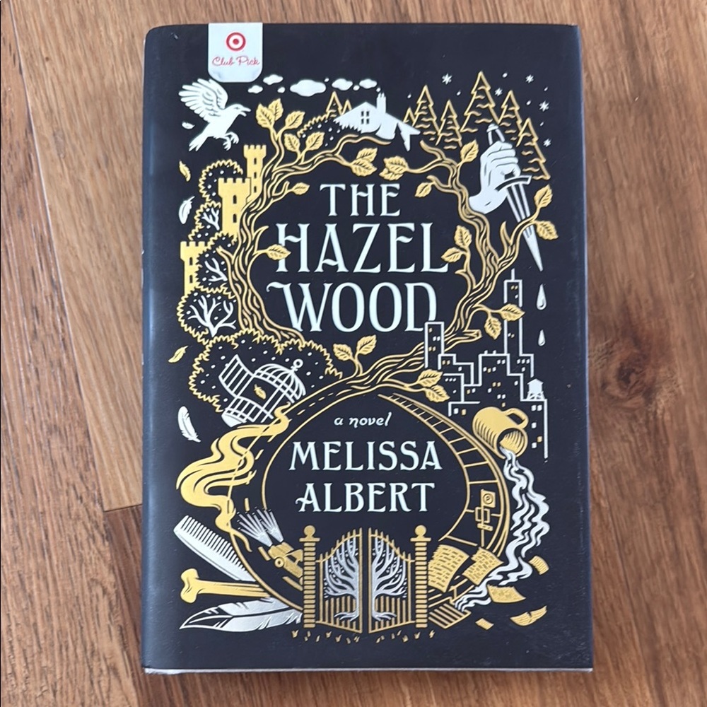 The Hazel Wood Novel with Gold and Black Cover
